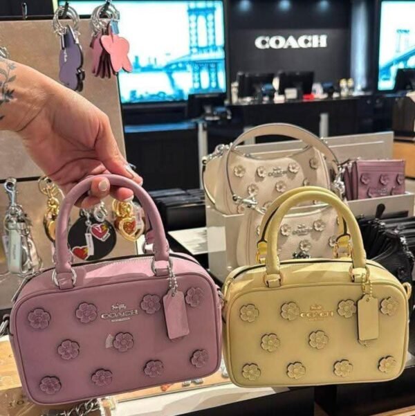 BOLSA COACH FLORES
